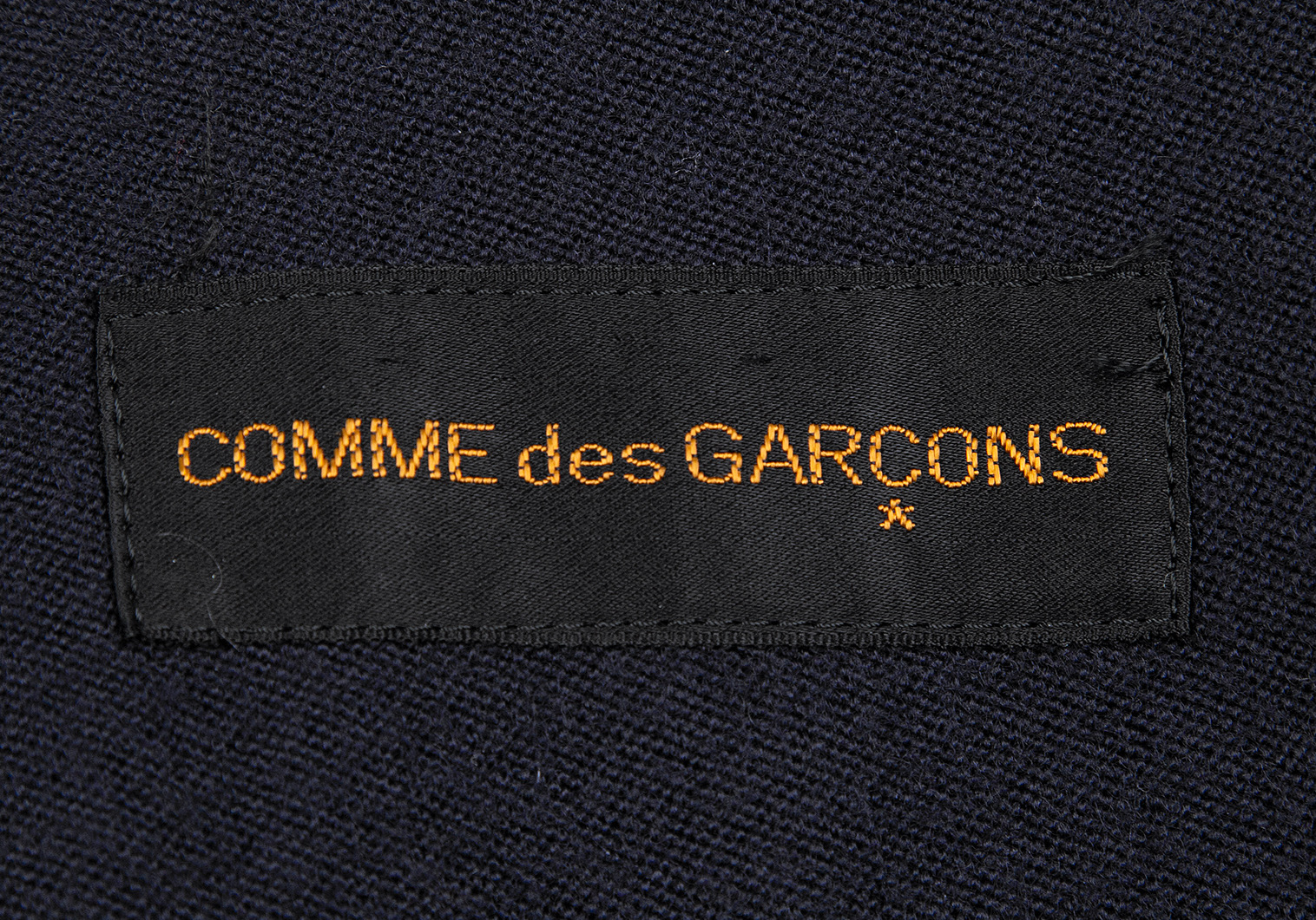 コムデギャルソンCOMME des GARCONS カーブカラーデザインボタンレス