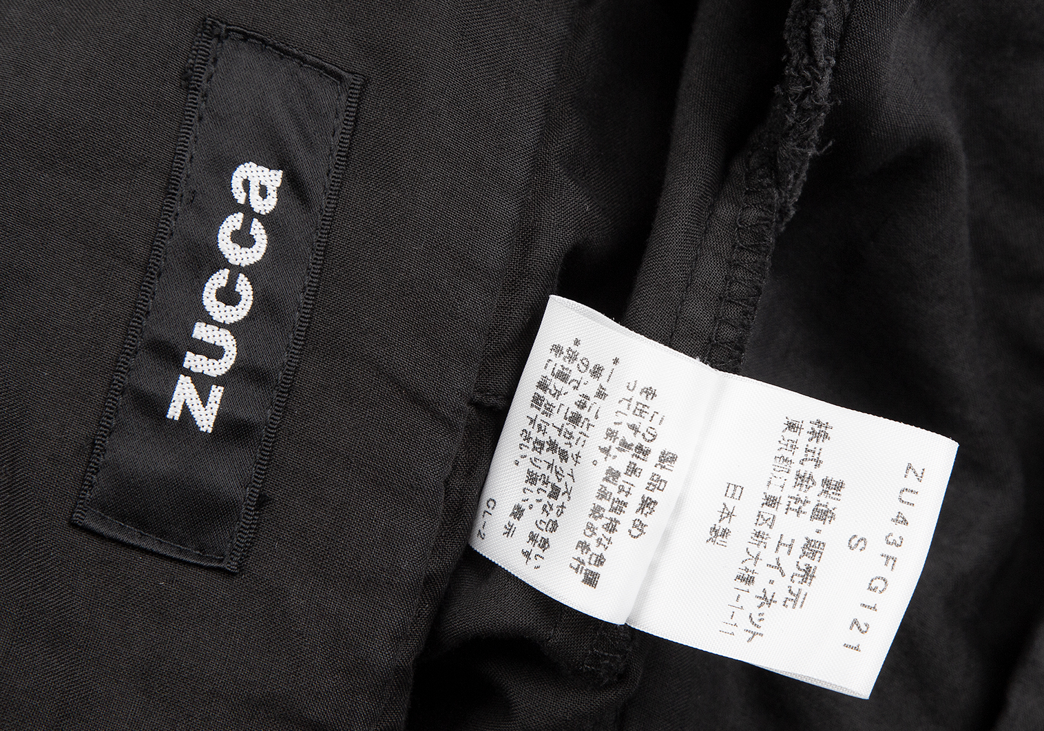 ズッカzucca 製品染め断ち切りデザインプリーツラップスカート 黒S